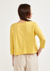 Yellow 3/4 sleeve shirt with rounded ending