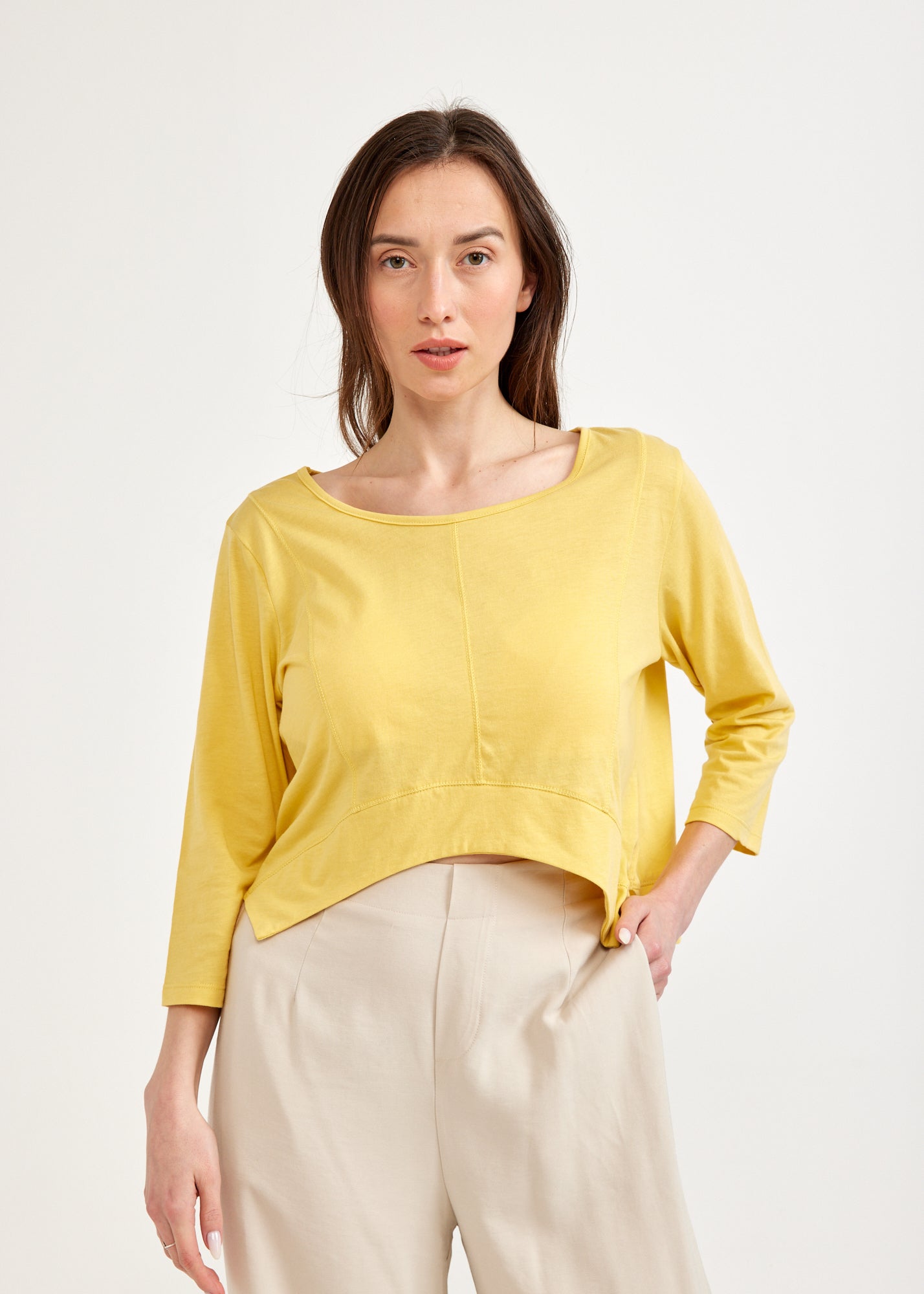 Yellow 3/4 sleeve shirt with rounded ending