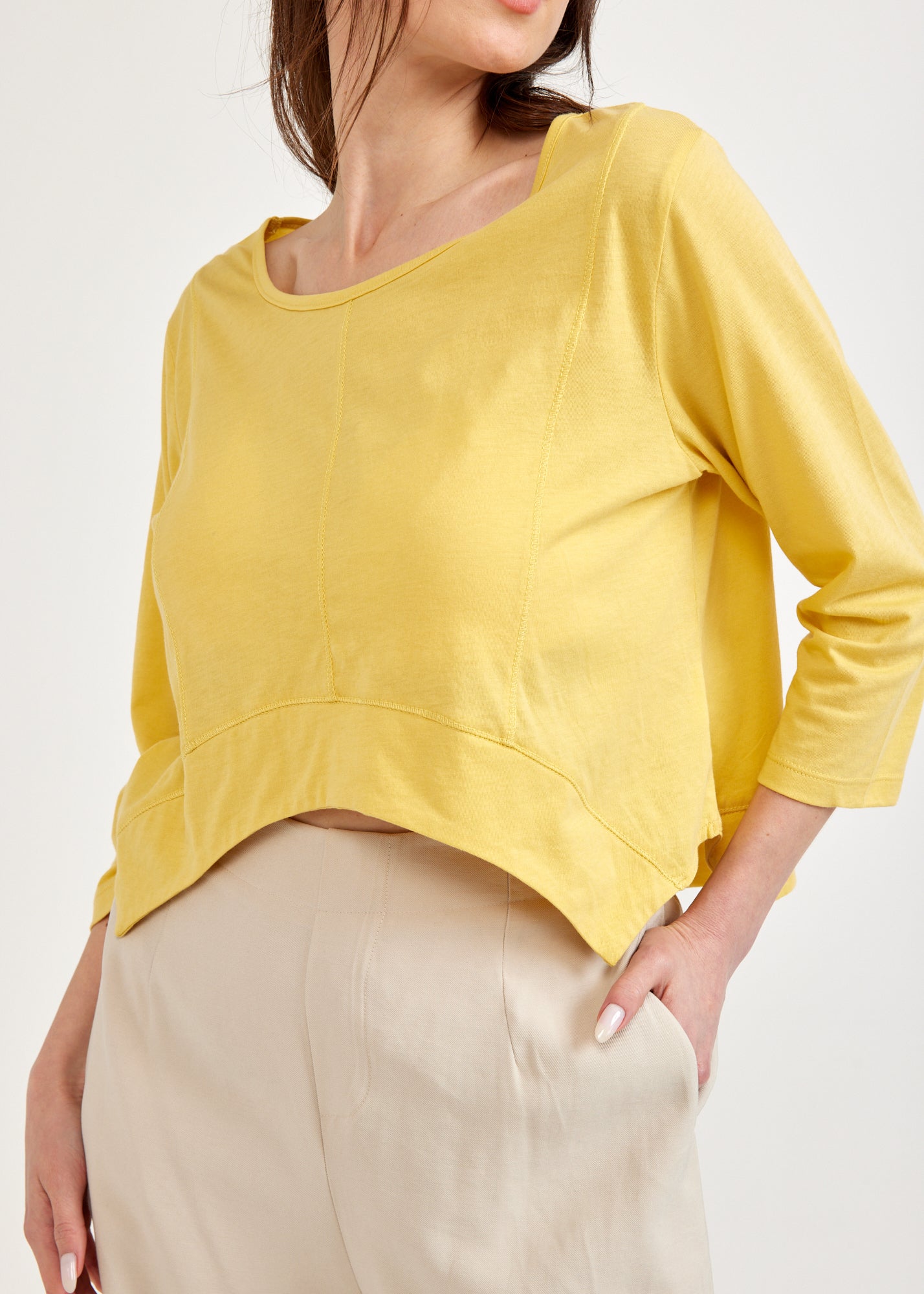 Yellow 3/4 sleeve shirt with rounded ending