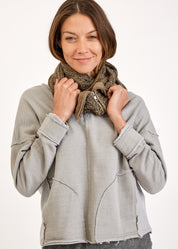 Scarf with a green zipper