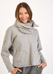 Scarf with a gray zipper