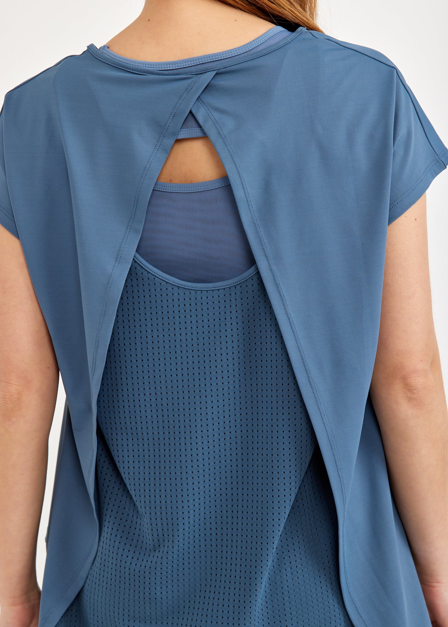 Back training shirt like a blue mesh tank top