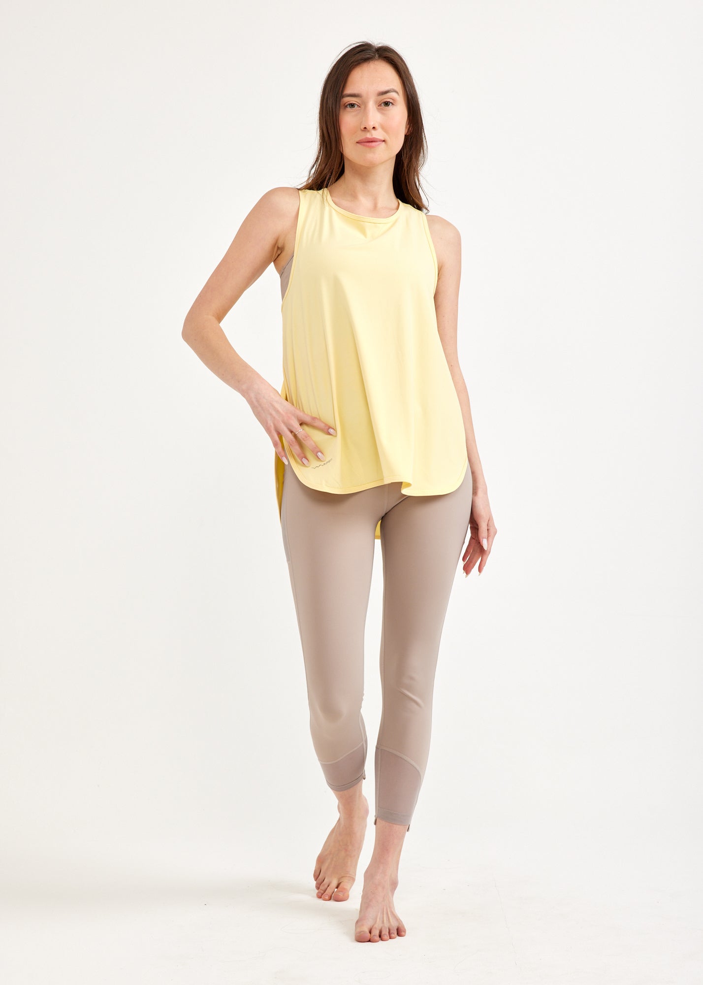 Yellow tank top open on the sides