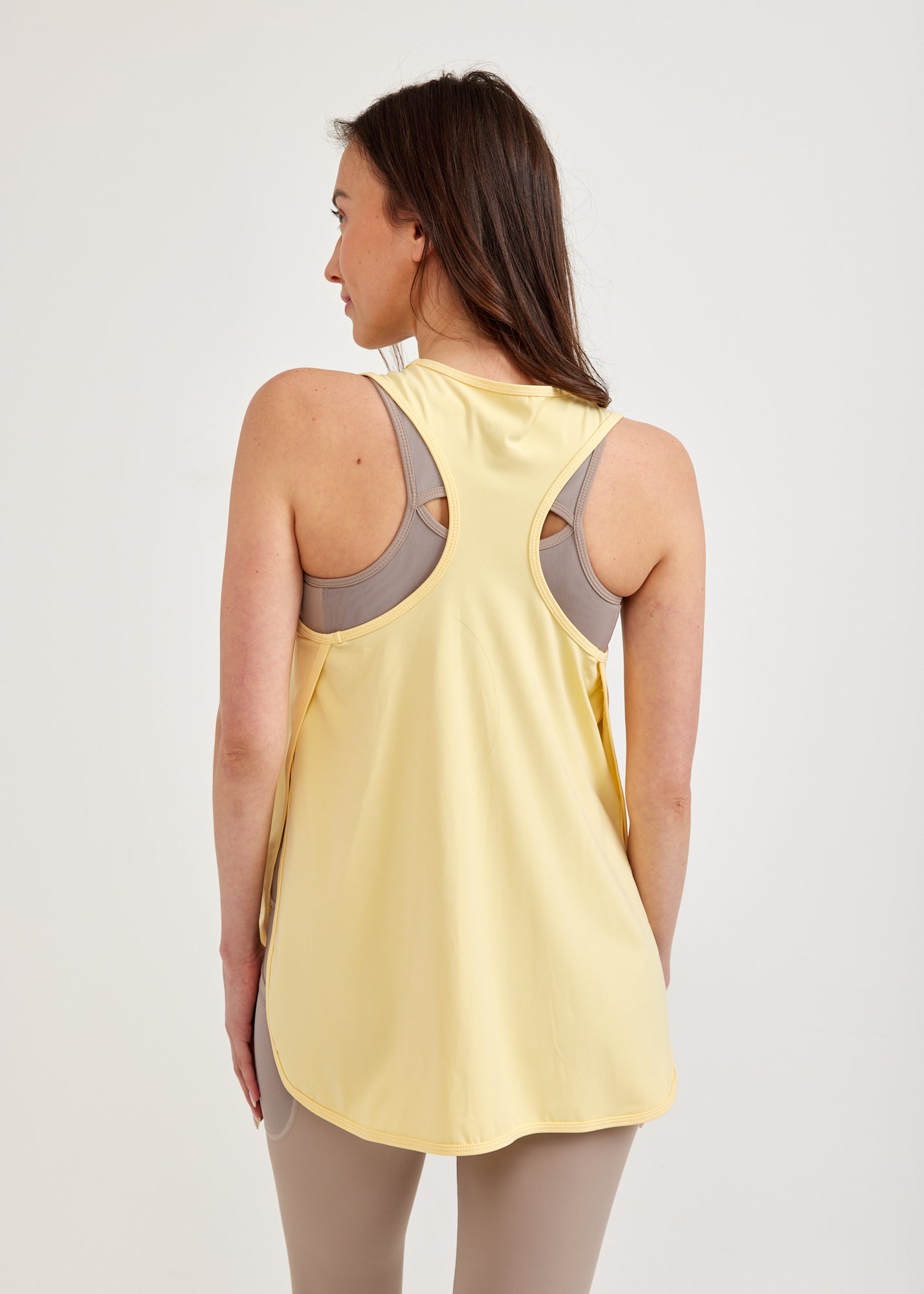 Yellow tank top open on the sides