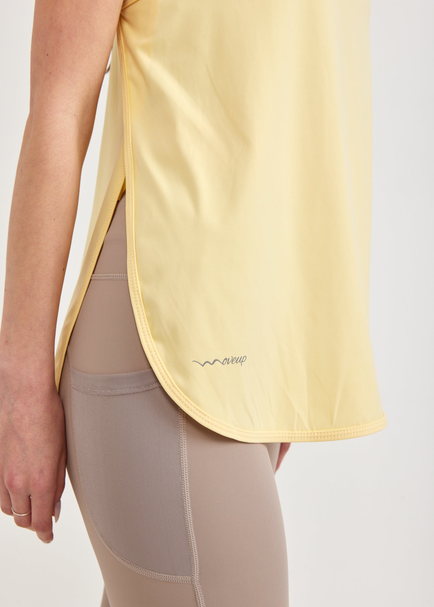 Yellow tank top open on the sides