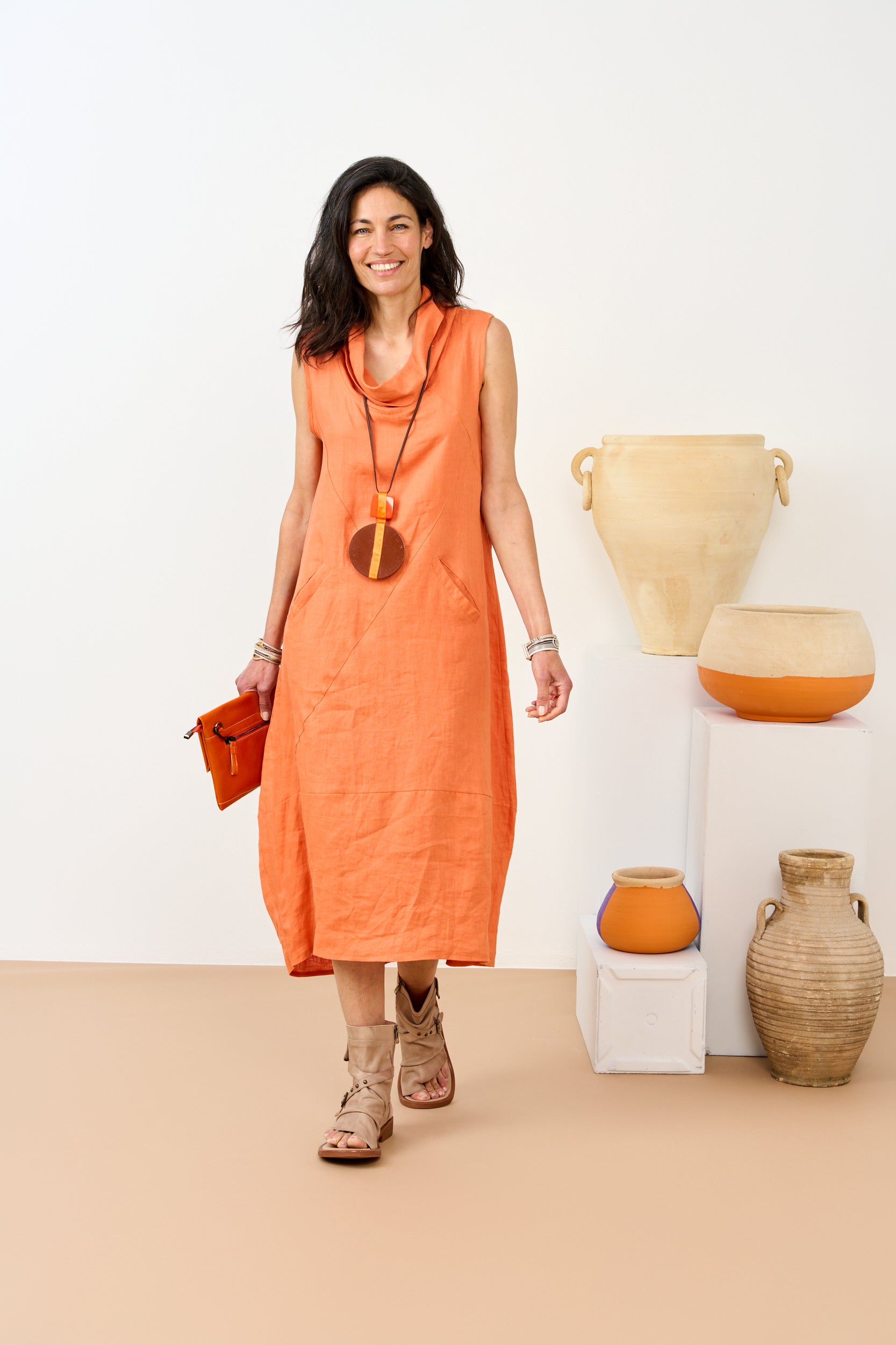 High sandals with straps and brown buckle