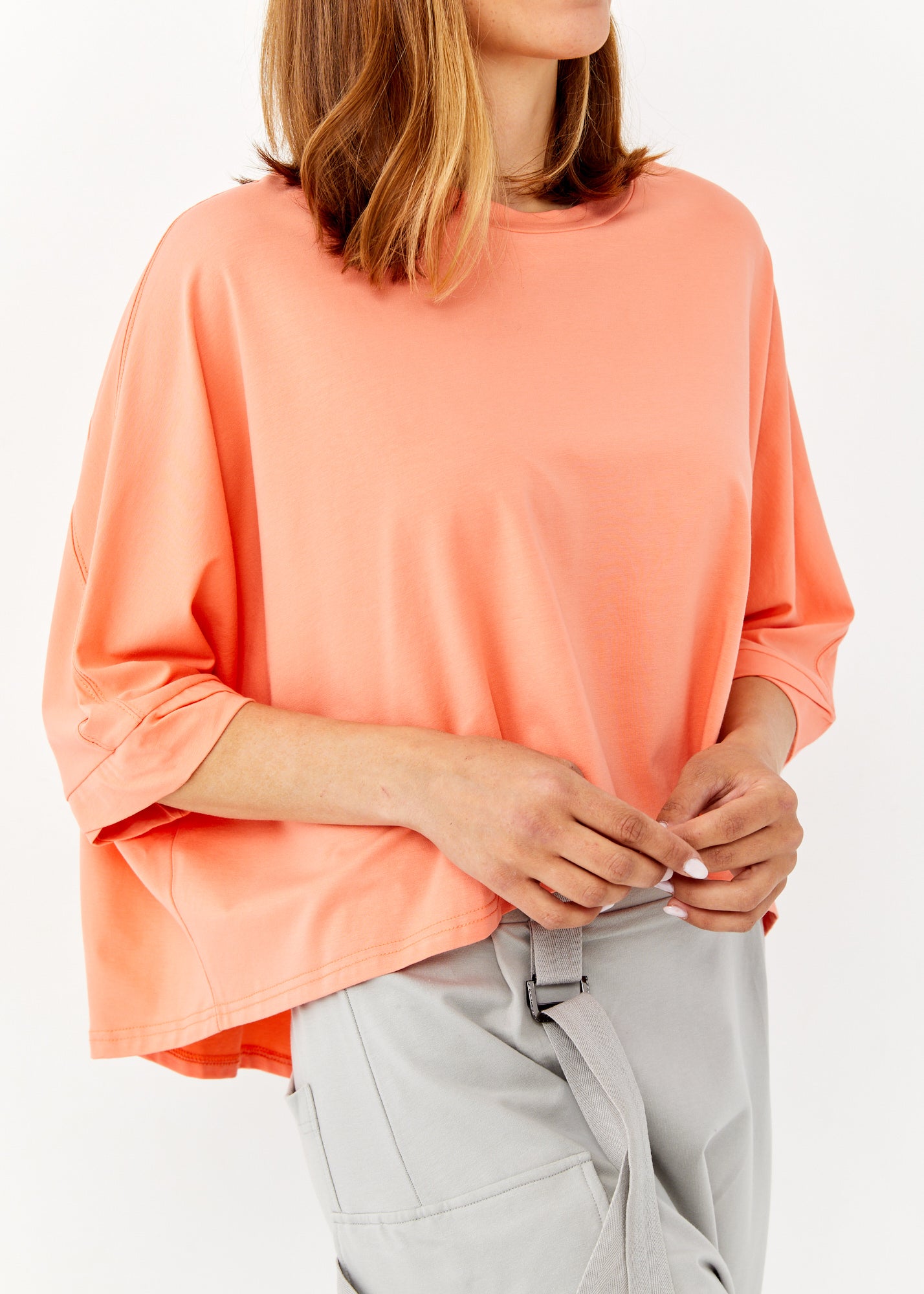 Short sleeve shirt with twisted orange ending