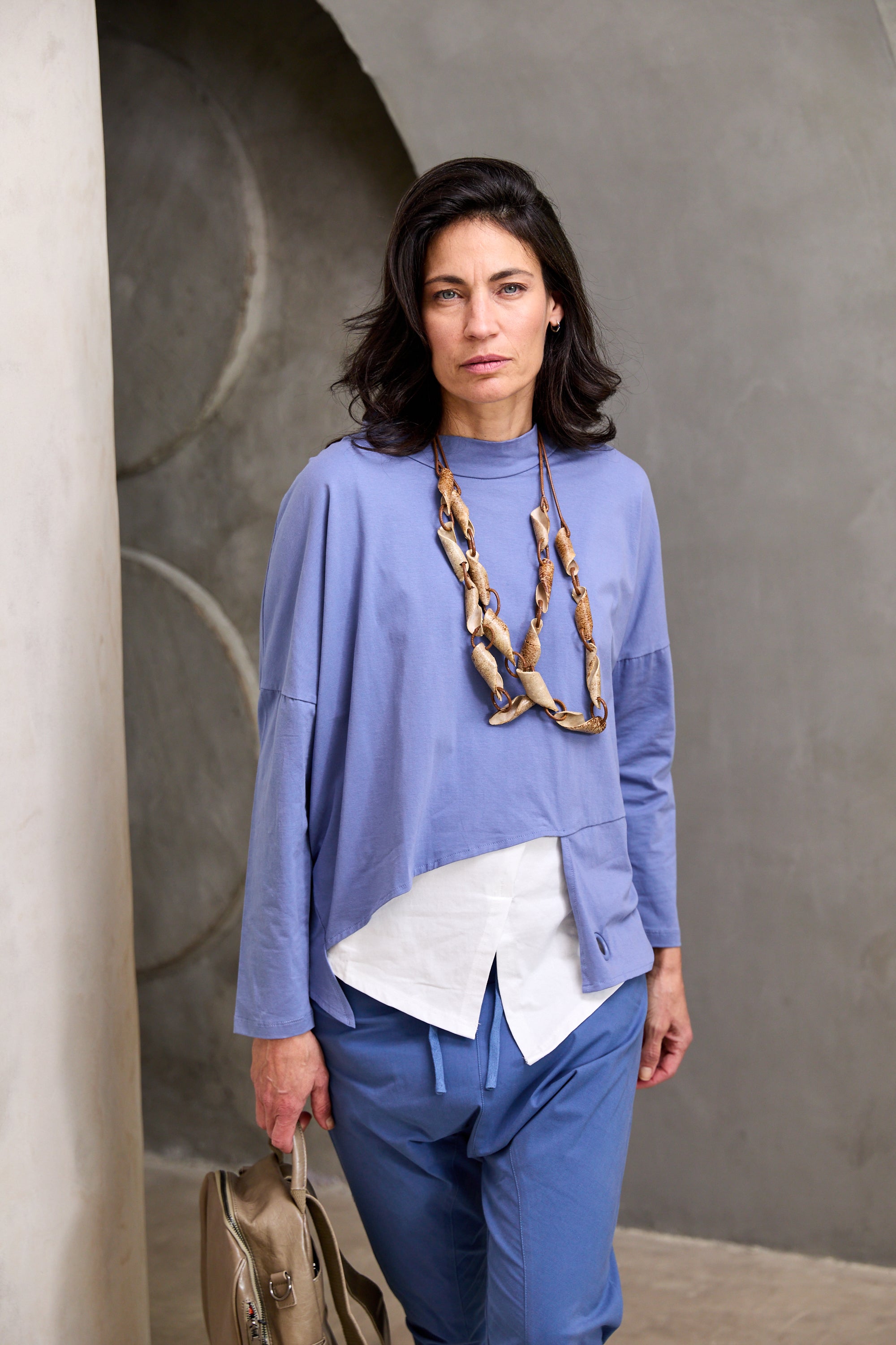 shell necklace on a beige rope