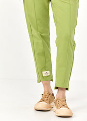 Pants seam in the middle and a light green patch