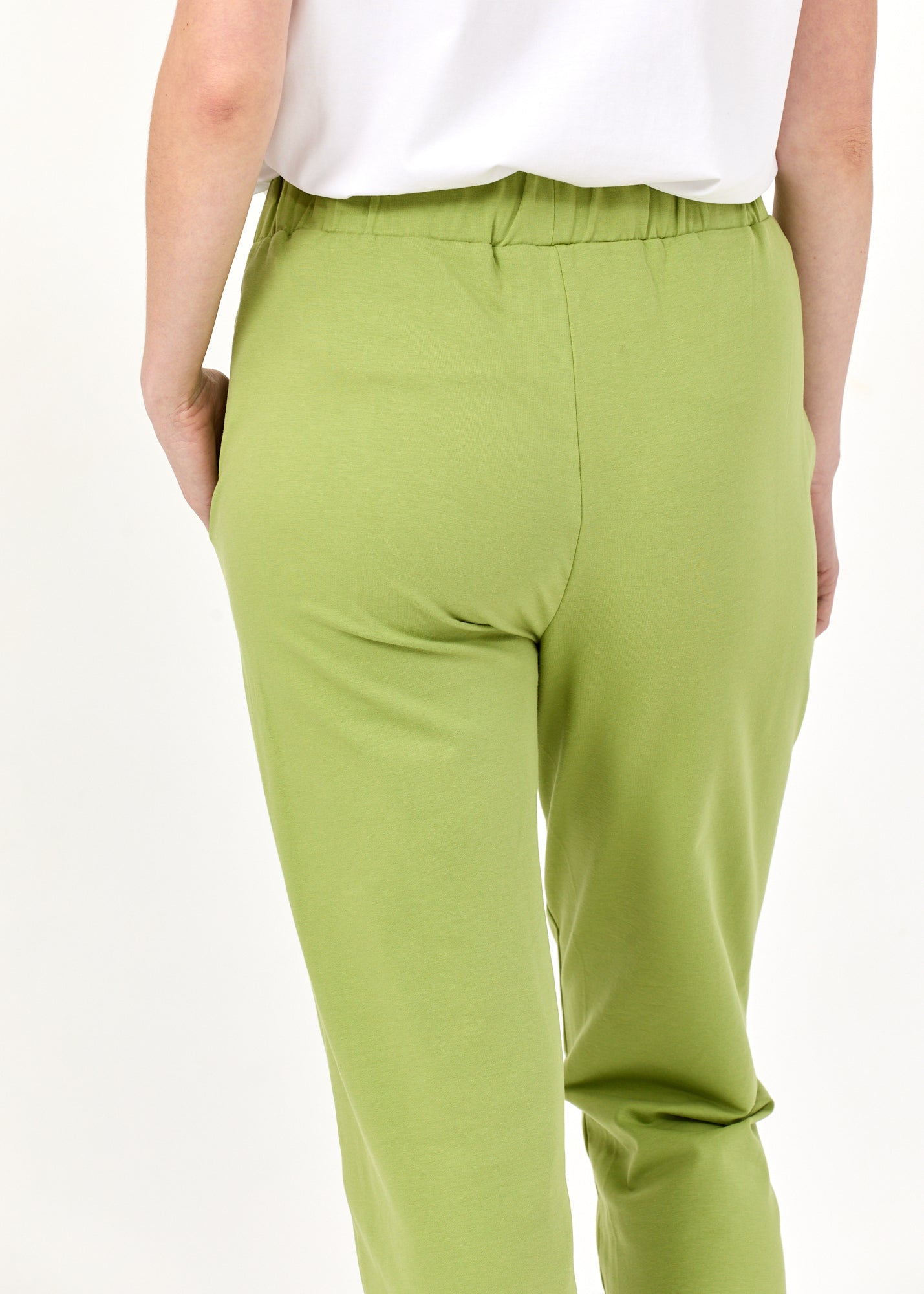 Pants seam in the middle and a light green patch