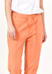 Pants seam in the middle and an orange patch