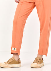Pants seam in the middle and an orange patch