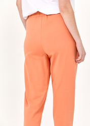 Pants seam in the middle and an orange patch