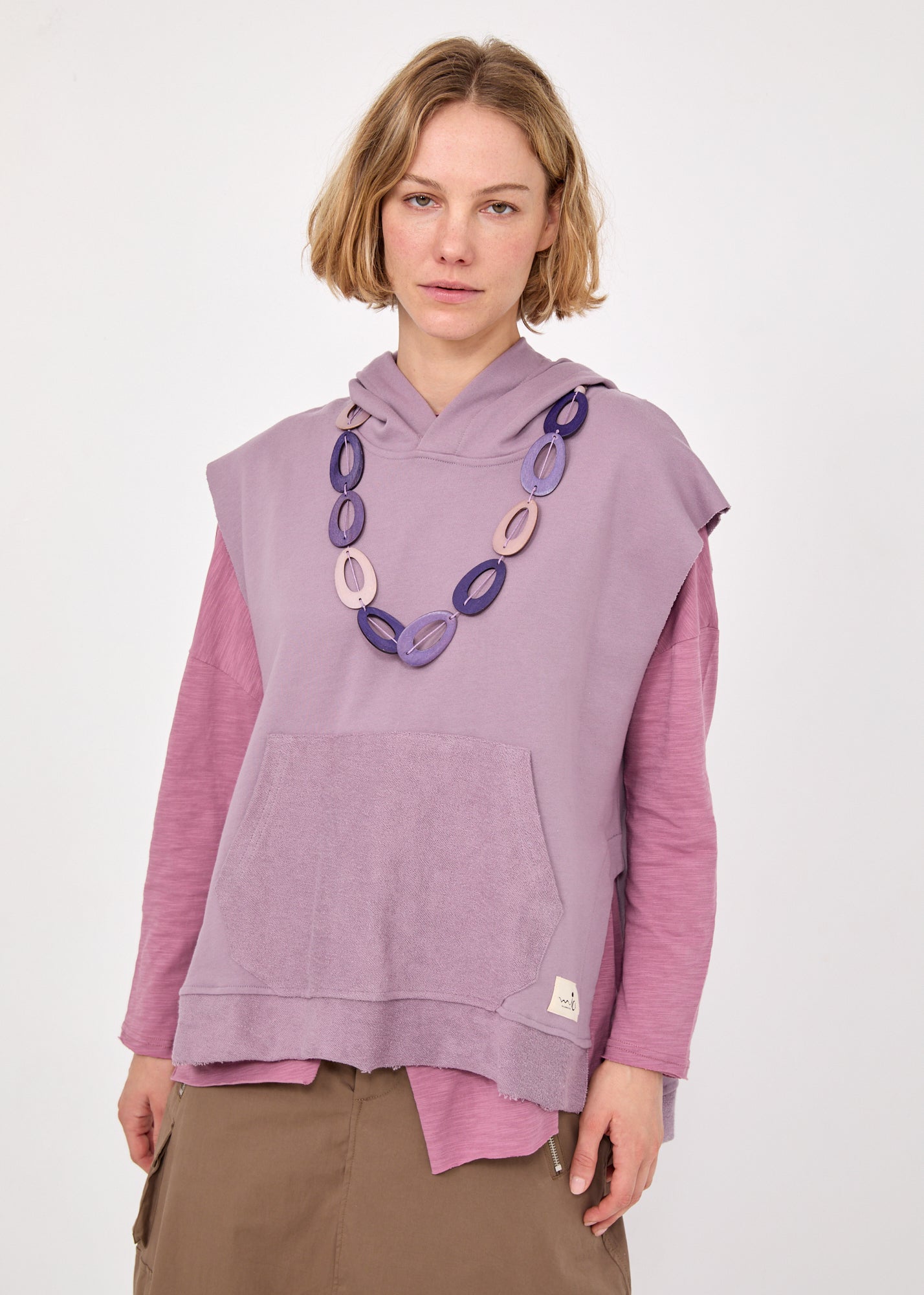 ווסט פתחים מעוגלים וכיס ורוד