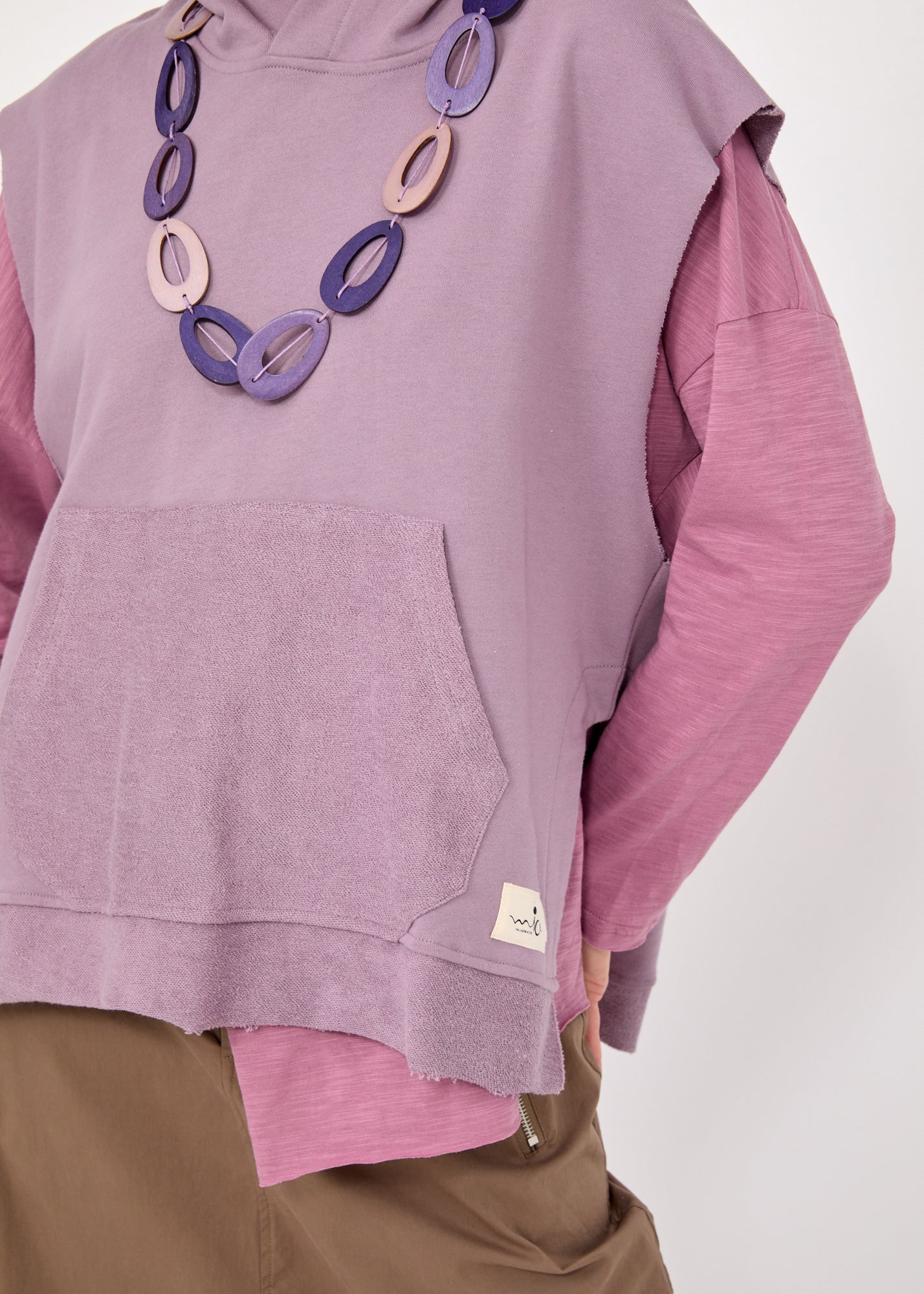 ווסט פתחים מעוגלים וכיס ורוד