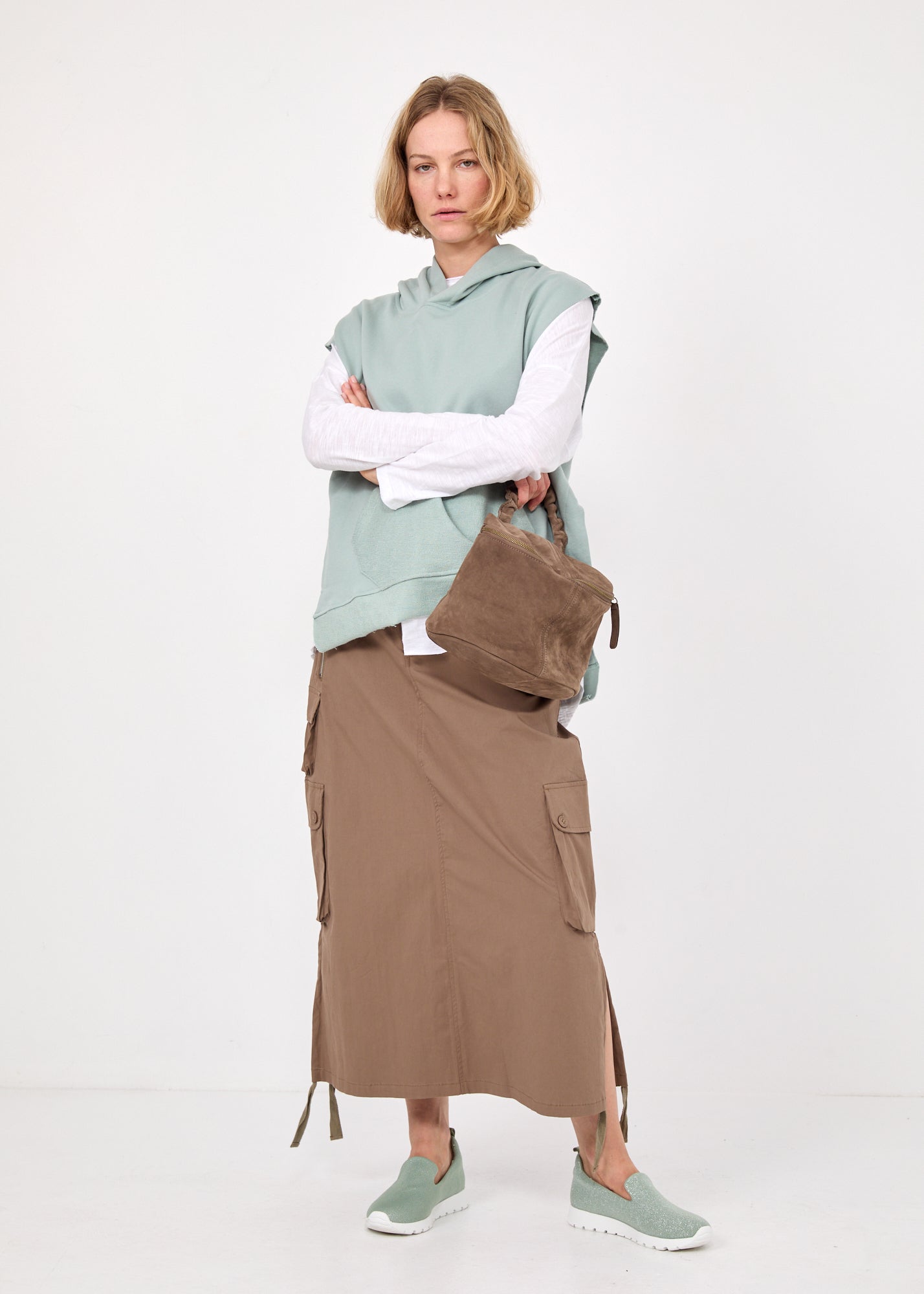 ווסט פתחים מעוגלים וכיס כחול בהיר