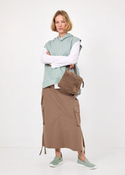 ווסט פתחים מעוגלים וכיס כחול בהיר