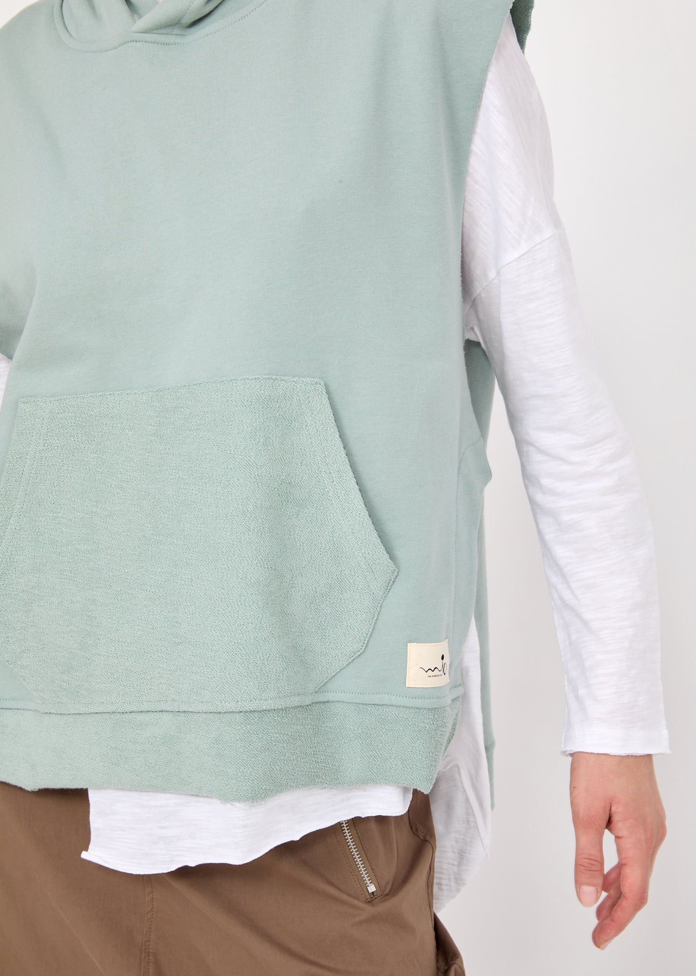 ווסט פתחים מעוגלים וכיס כחול בהיר