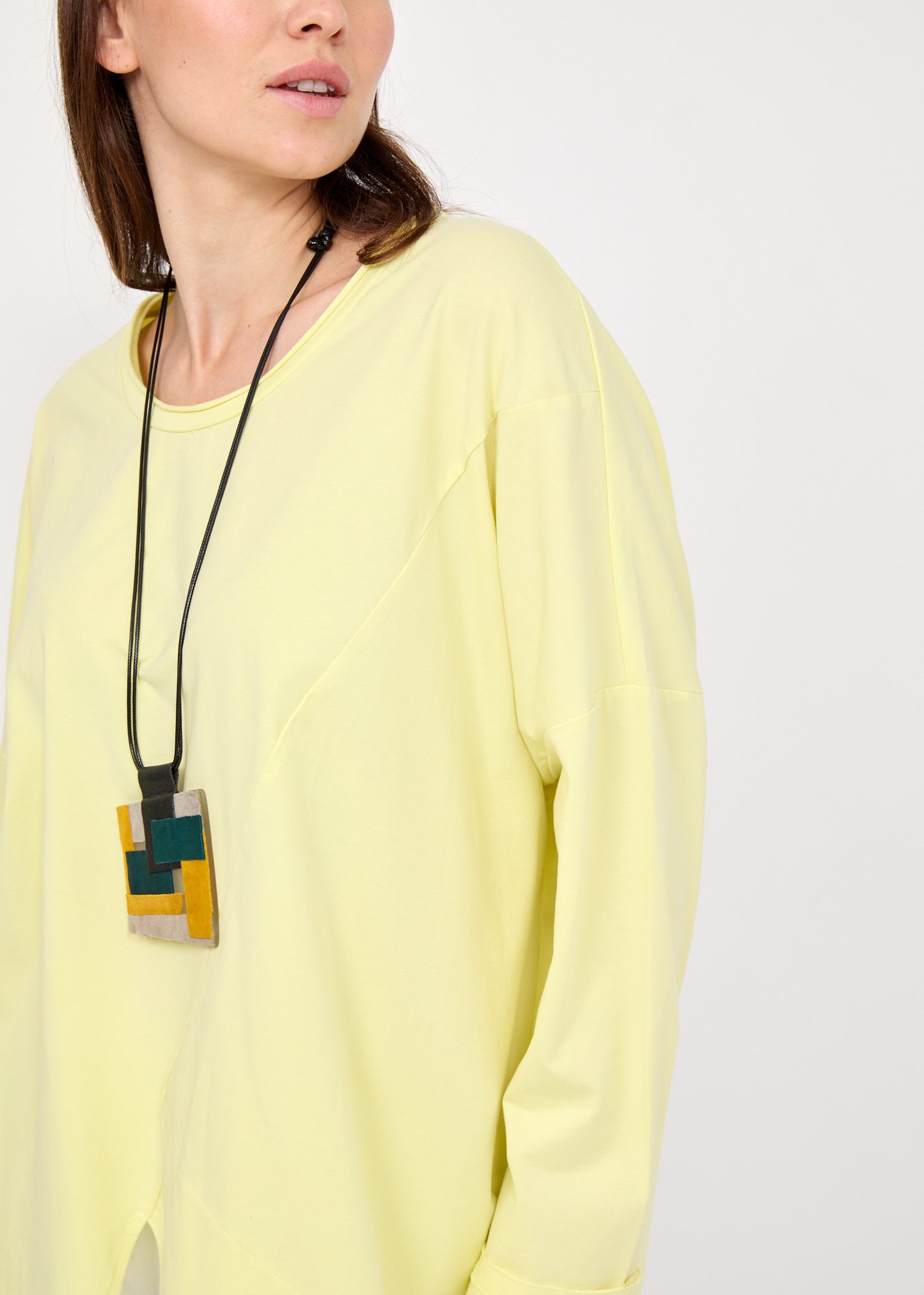 חולצה שרוול ארוך סיומת משולשים צהוב