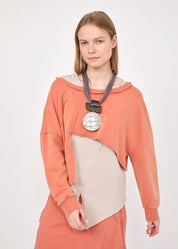 סווטשירט קצרצר אסימטרי כתום