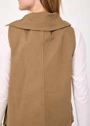 Asymmetric vest with brown button