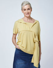 T-shirt with a large front pocket and a yellow hoodie