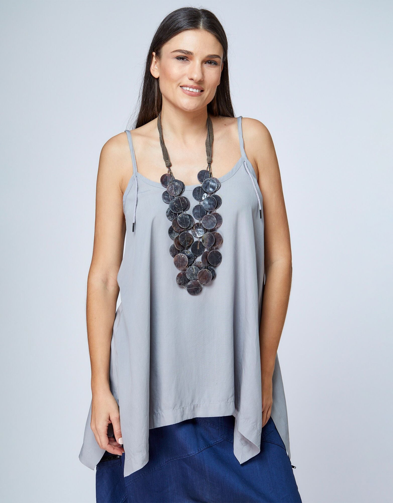 Spaghetti spilled fabric tank top with side seams and light gray white stitching