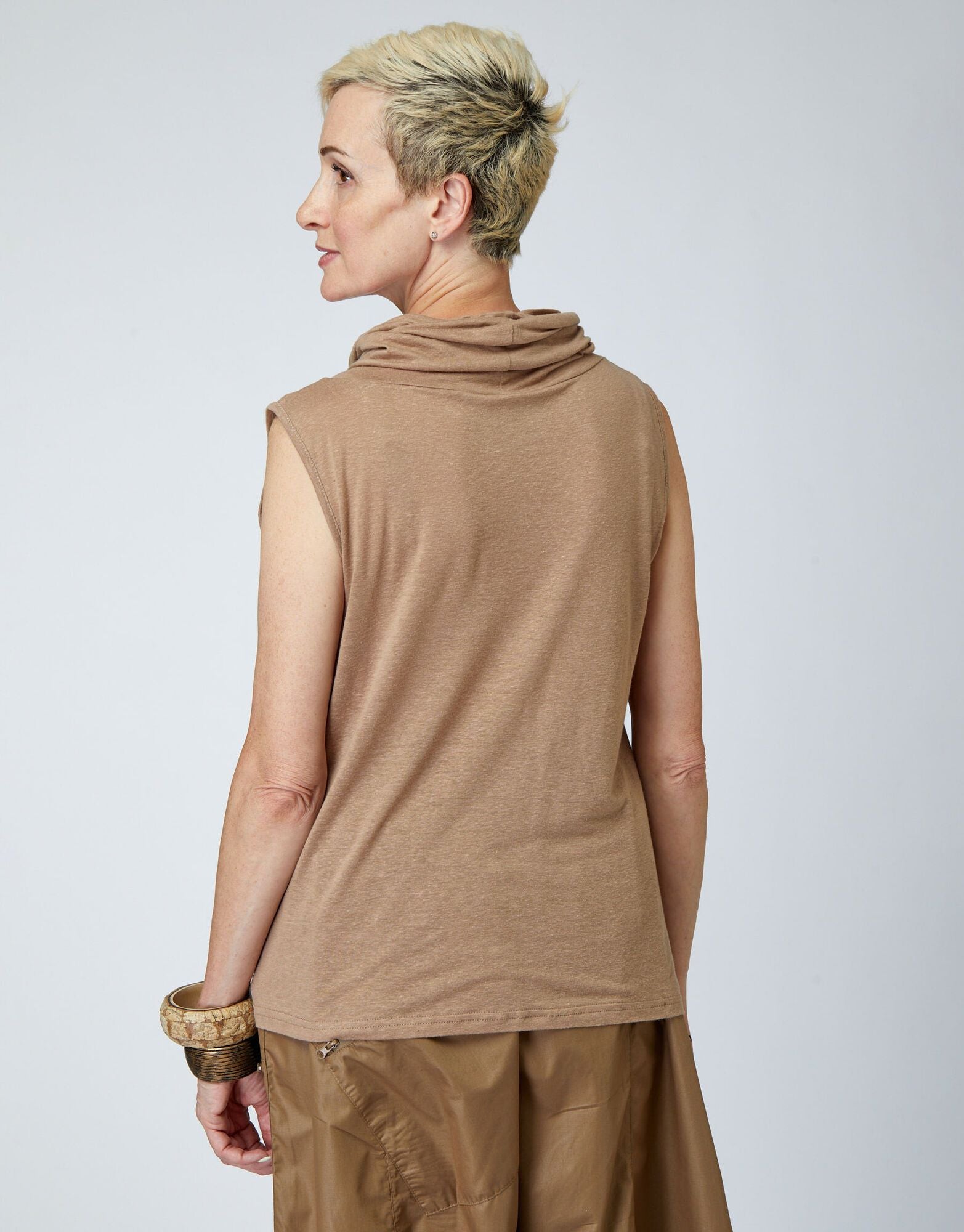 A shirt without a shirt. Short with a brown turtleneck