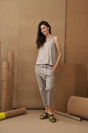 Leather flip-flops with two twisted straps, green