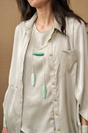 Delicate necklace with three blue beads