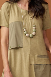 Handmade necklace made of green wood chip beads