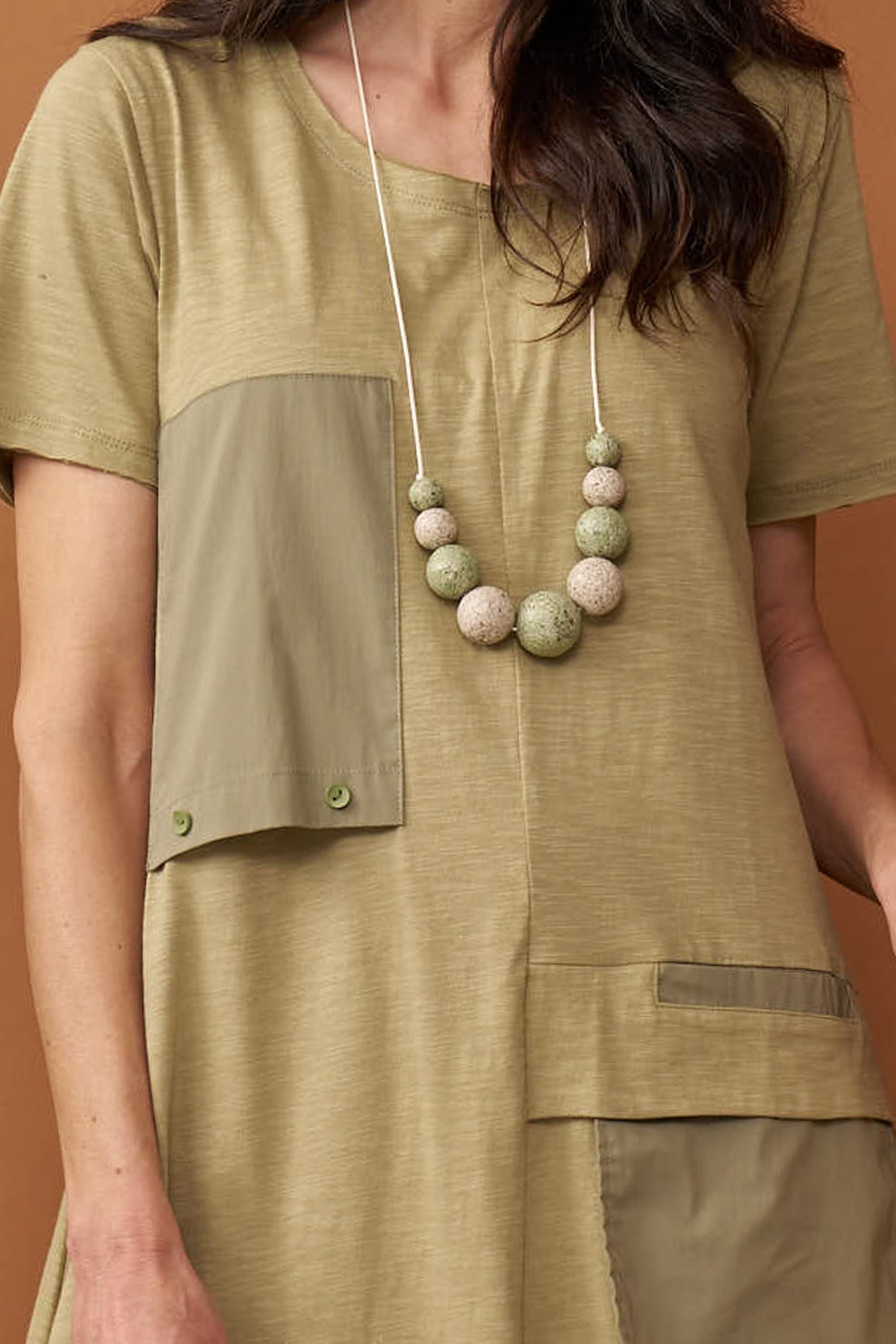 Handmade necklace made of green wood chip beads