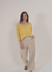 Yellow 3/4 sleeve shirt with rounded ending