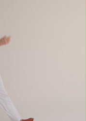 Orange tank top with a flowing collar
