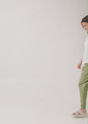 Baggy pants with diagonal cuts and buckles, brown wash