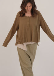 Yellow long sleeve shirt with triangular cuts
