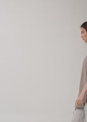 Diagonal tank top with brown pocket