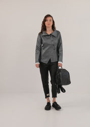 Pink leather-like jacket with diagonal folds