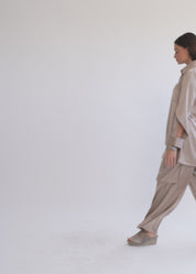 Green satin button-down shirt with open sleeves