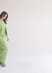 Green button-up pleated pocket vest