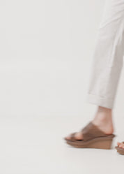 Green leather platform heel shoes with buckle and knot