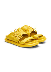 Shrink leather flip-flops with yellow knot