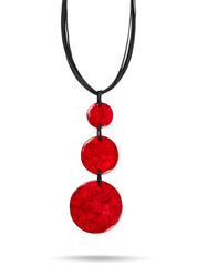 A chain of 3 resin circles on a red thread