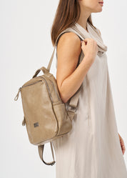 Brown leather backpack with front zipper