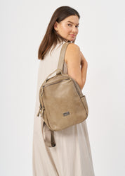 Brown leather backpack with front zipper