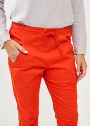 מכנסיים ארוכים כיווץ בברך כתום