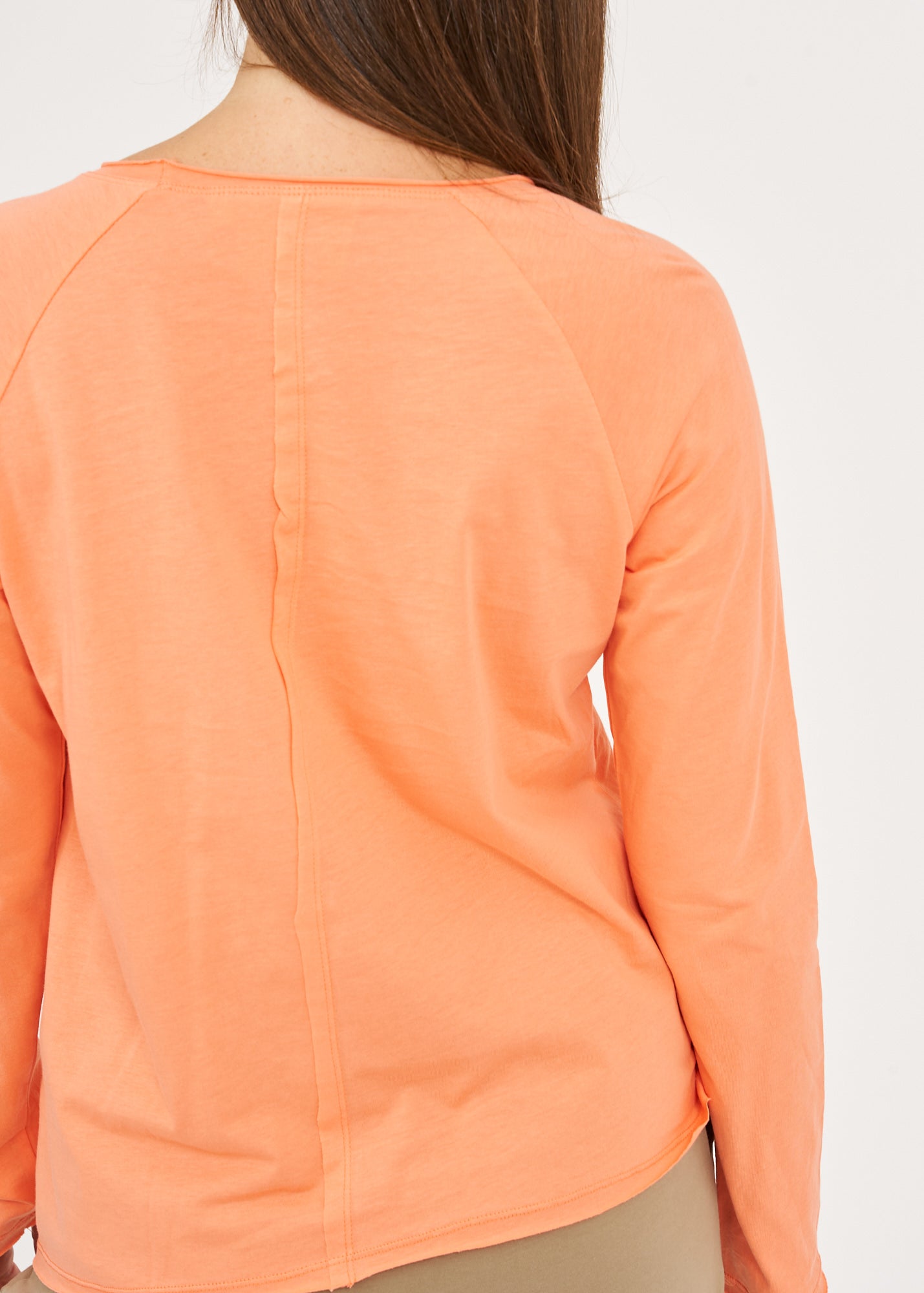 Orange cut long sleeve shirt