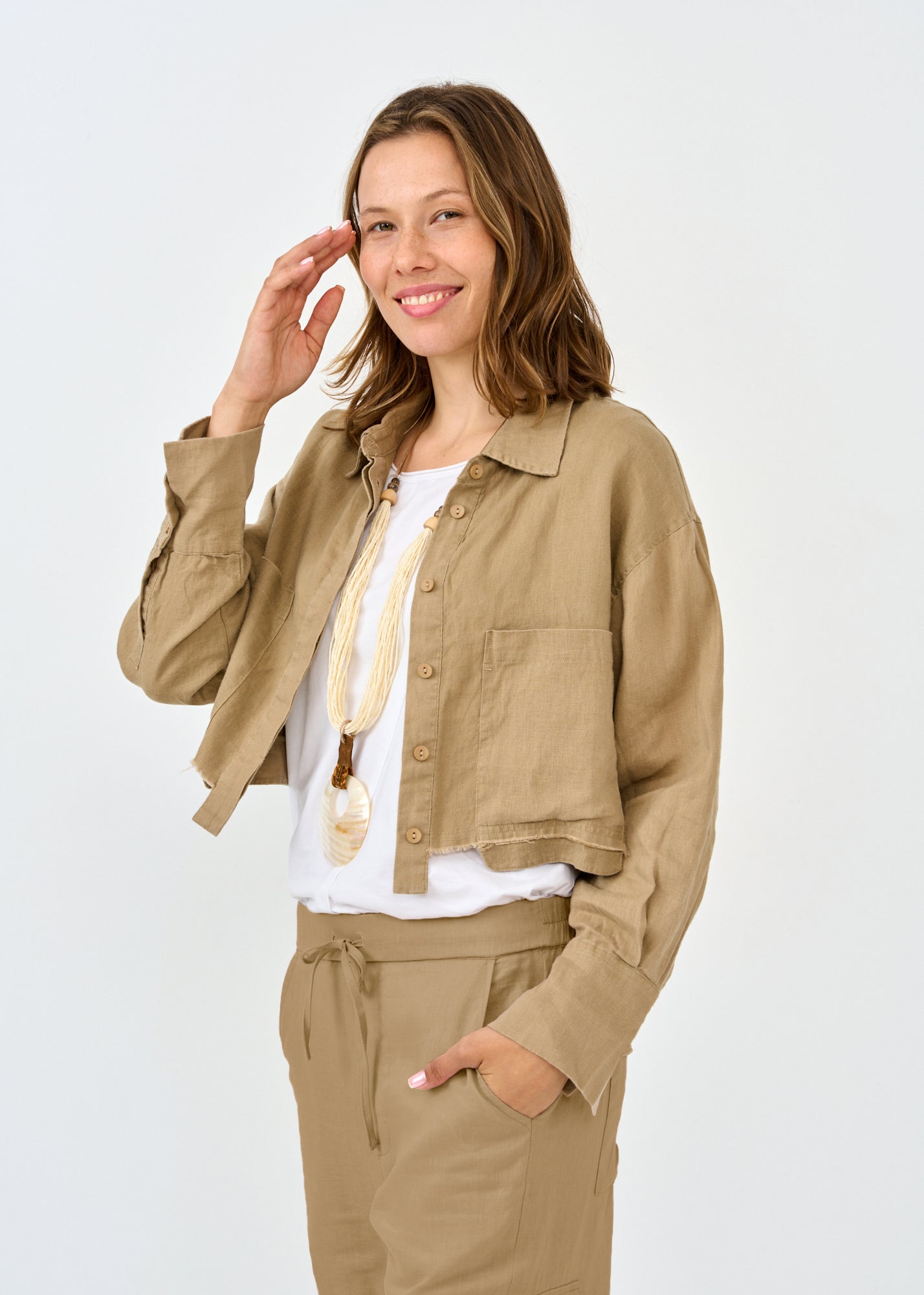Short linen button-up with pockets that pop out brown