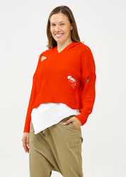 סריג עם כובע סיומת פרומה כתום