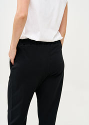 Pants seam in the middle and a black patch